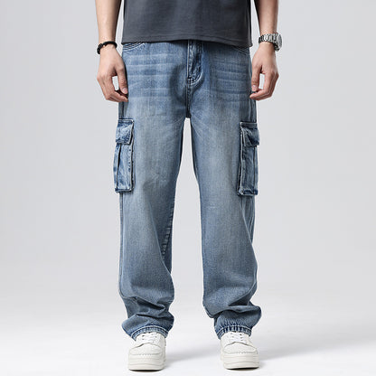Person wearing light blue cargo jeans on a plain background