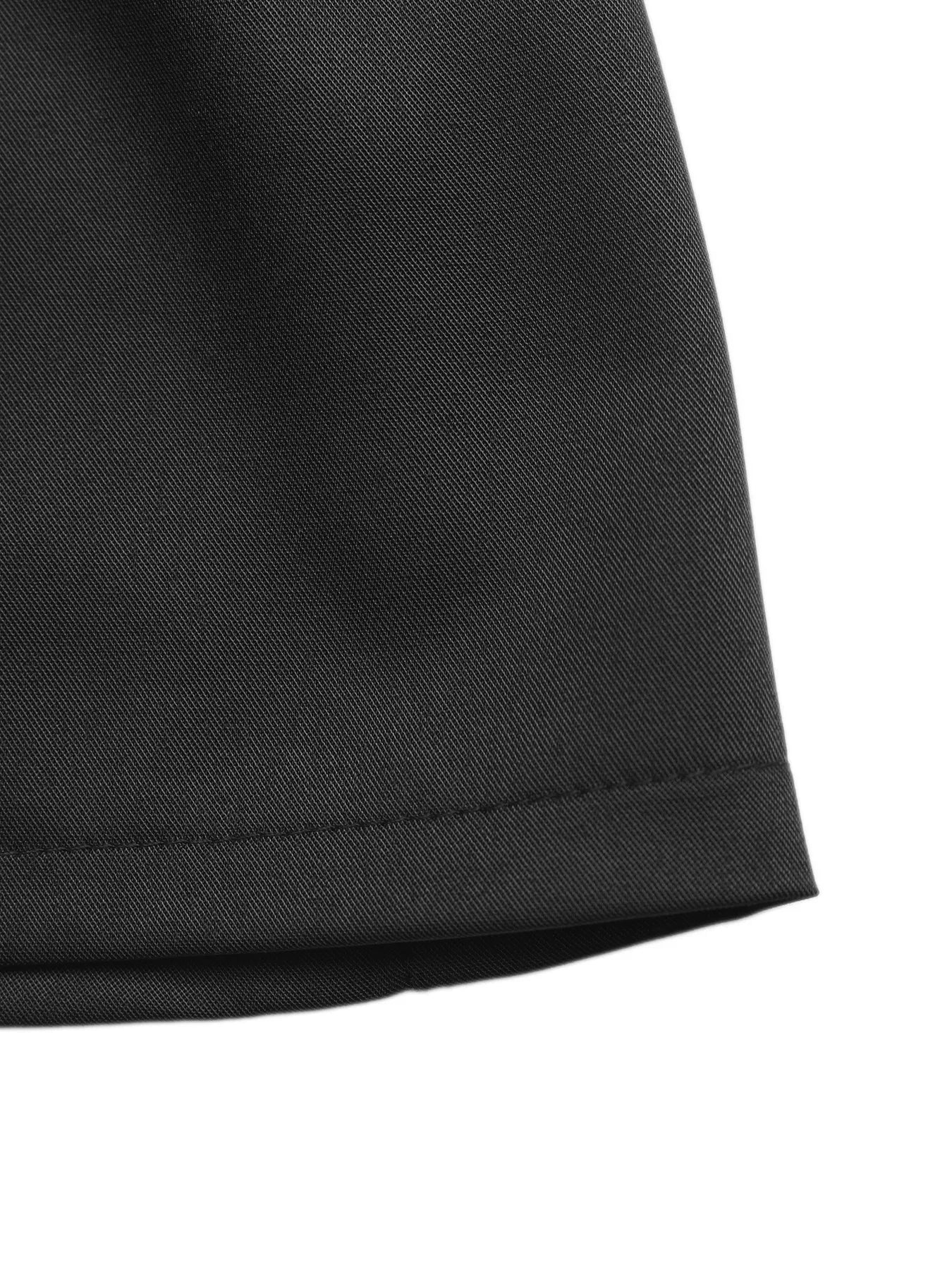 Close-up of a black fabric texture on a white background