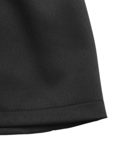 Close-up of a black fabric texture on a white background