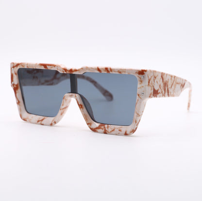 Sunglasses with a marbleized frame on a white background