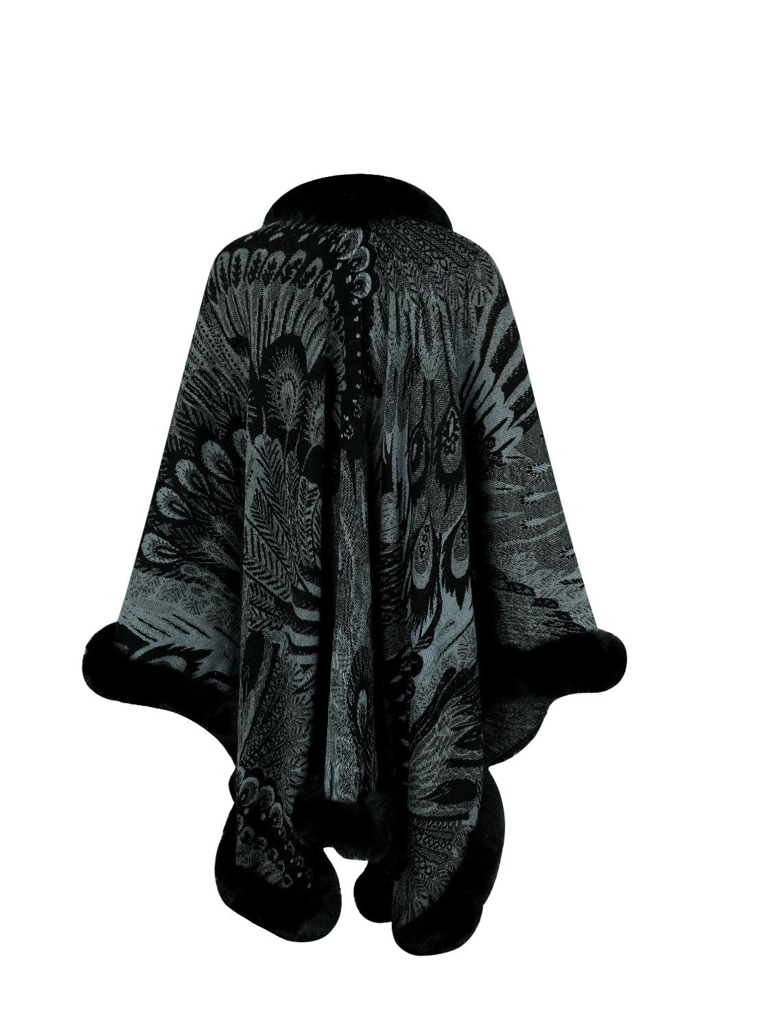 Black and gray patterned cape with fur trim on a white background