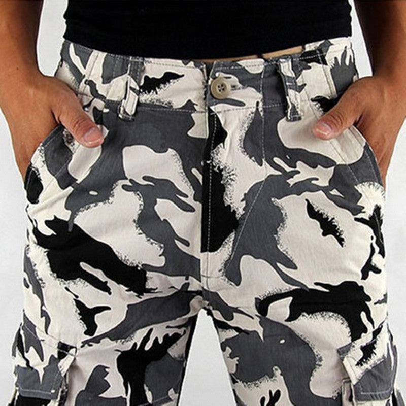 Black and white camouflage shorts worn by a person.