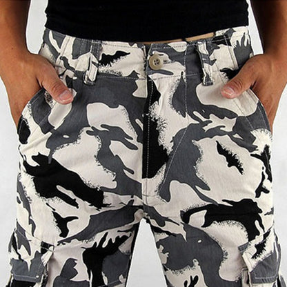 Black and white camouflage shorts worn by a person.