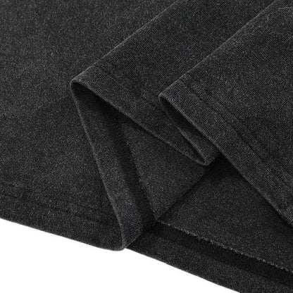 Close-up of dark gray fabric with a textured surface