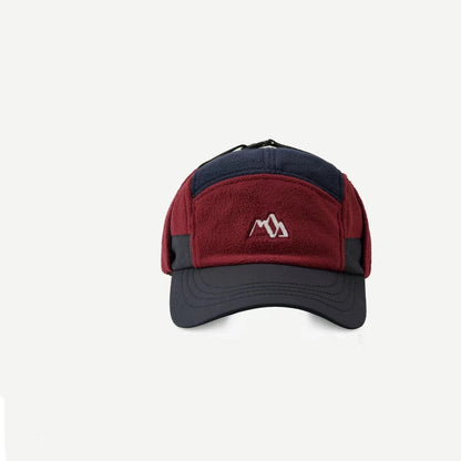 Red and navy cap with a logo on a white background