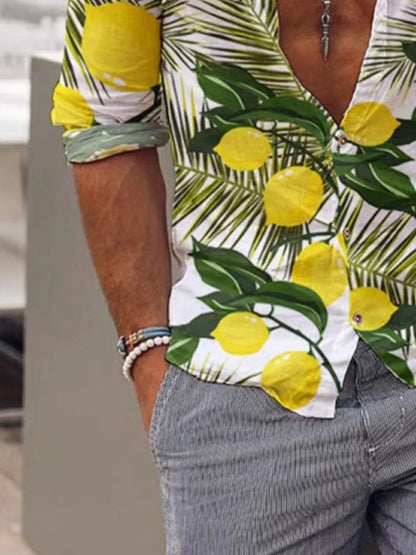Person wearing a shirt with lemon and palm leaf pattern