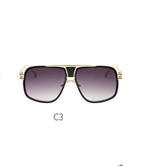 Sunglasses with gold frame and gradient lenses on a white background