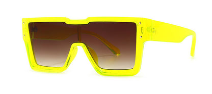 Yellow sunglasses with a gradient lens on a white background