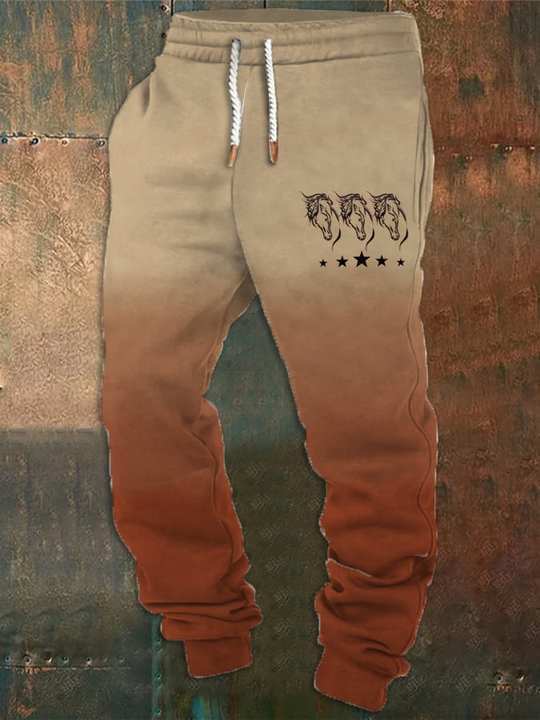 Brown and beige jogger pants with a graphic design on a textured background