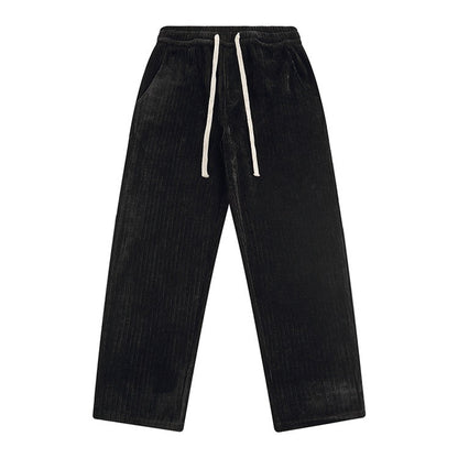 Black corduroy pants with white drawstring on a white background