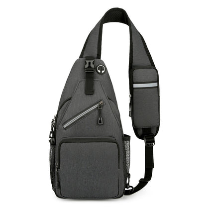 Gray sling bag with multiple pockets and zippers on a white background