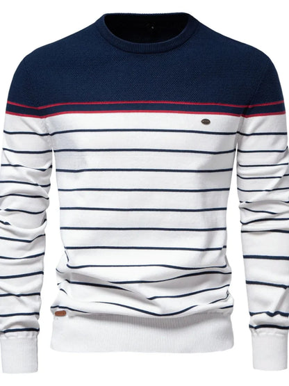 Navy and white striped sweater with red accents on a white background