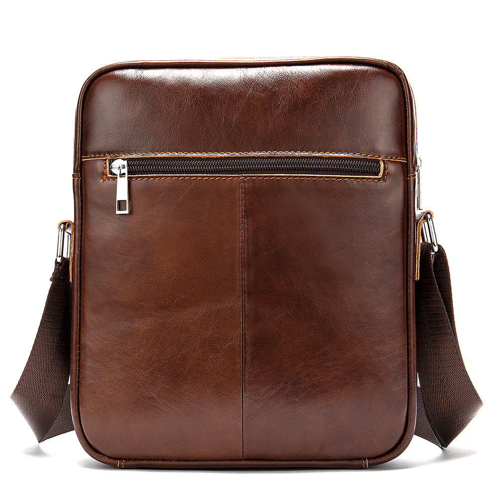 Brown leather crossbody bag on a white background