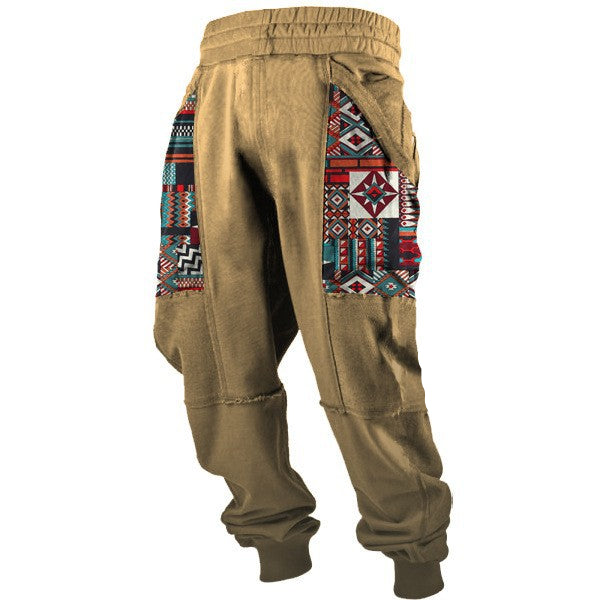 Beige sweatpants with colorful geometric patterns on a white background