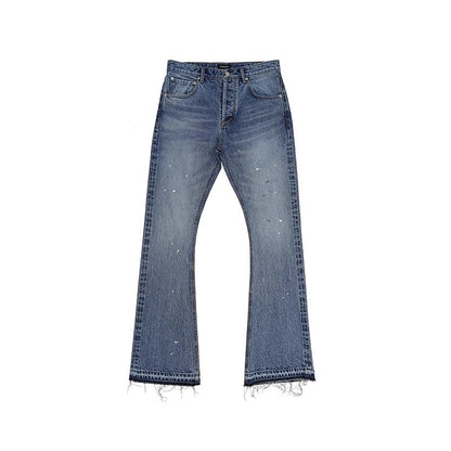Blue jeans with frayed hems on a white background
