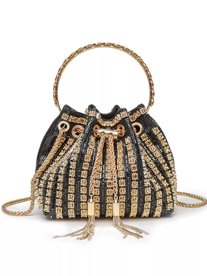 Black and gold beaded handbag with a chain strap on a white background