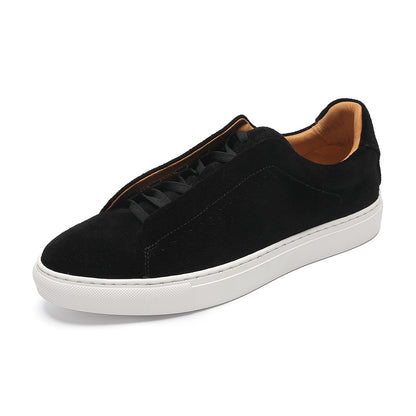 Black sneaker with white sole on a white background