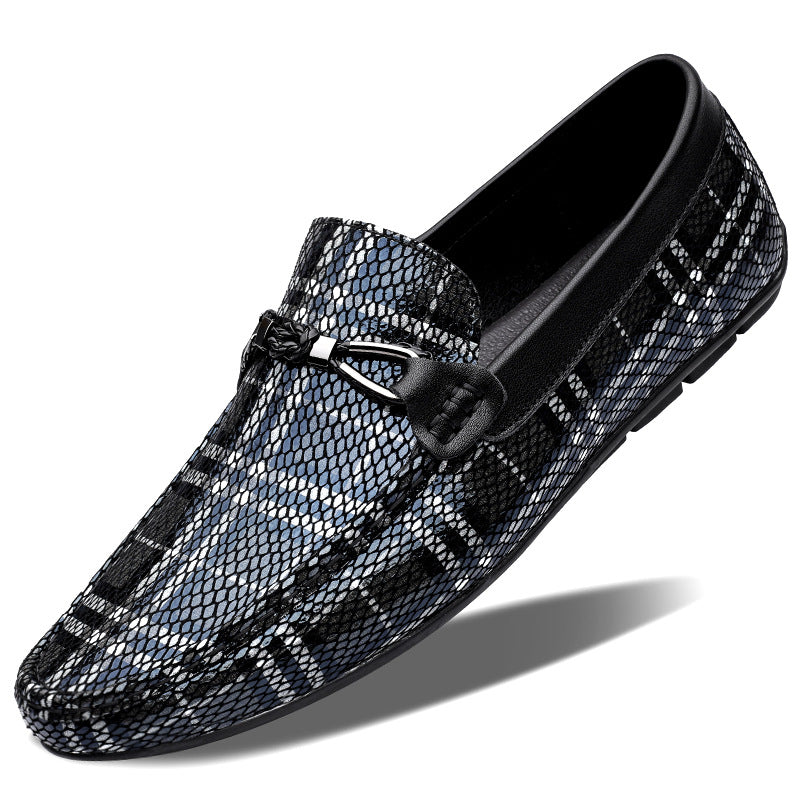 Black and gray patterned loafer shoe on a white background