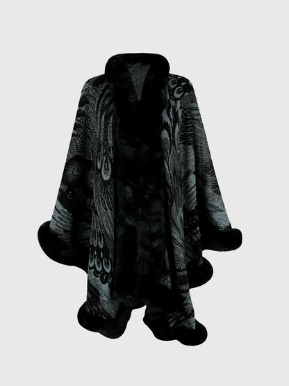 Black and gray patterned cape on a light gray background