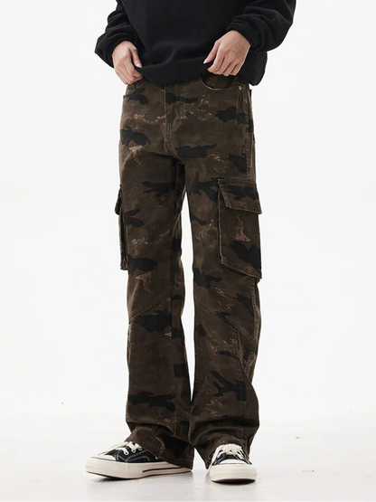 Person wearing camouflage cargo pants on a white background