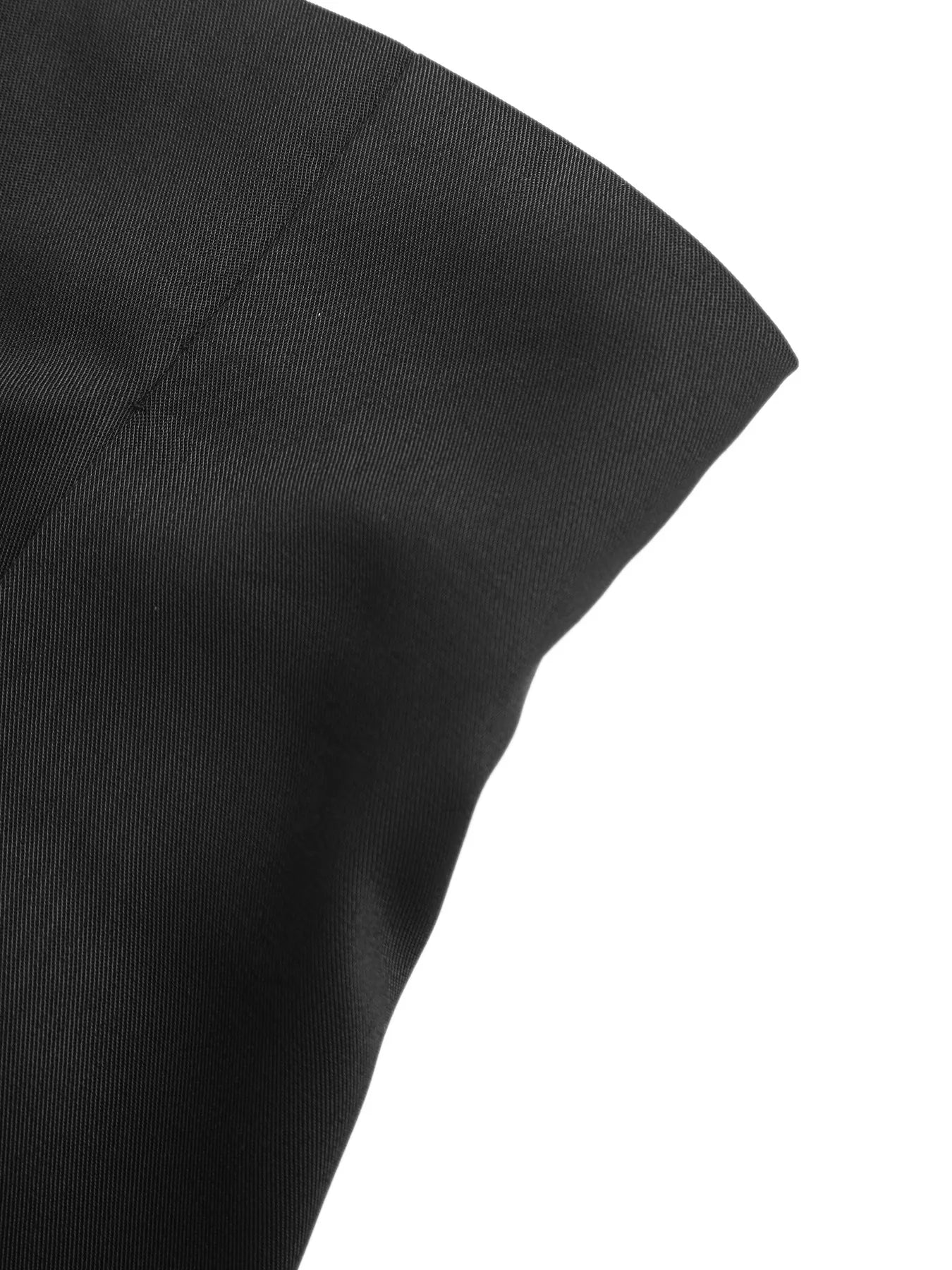 Close-up of a black fabric texture on a white background