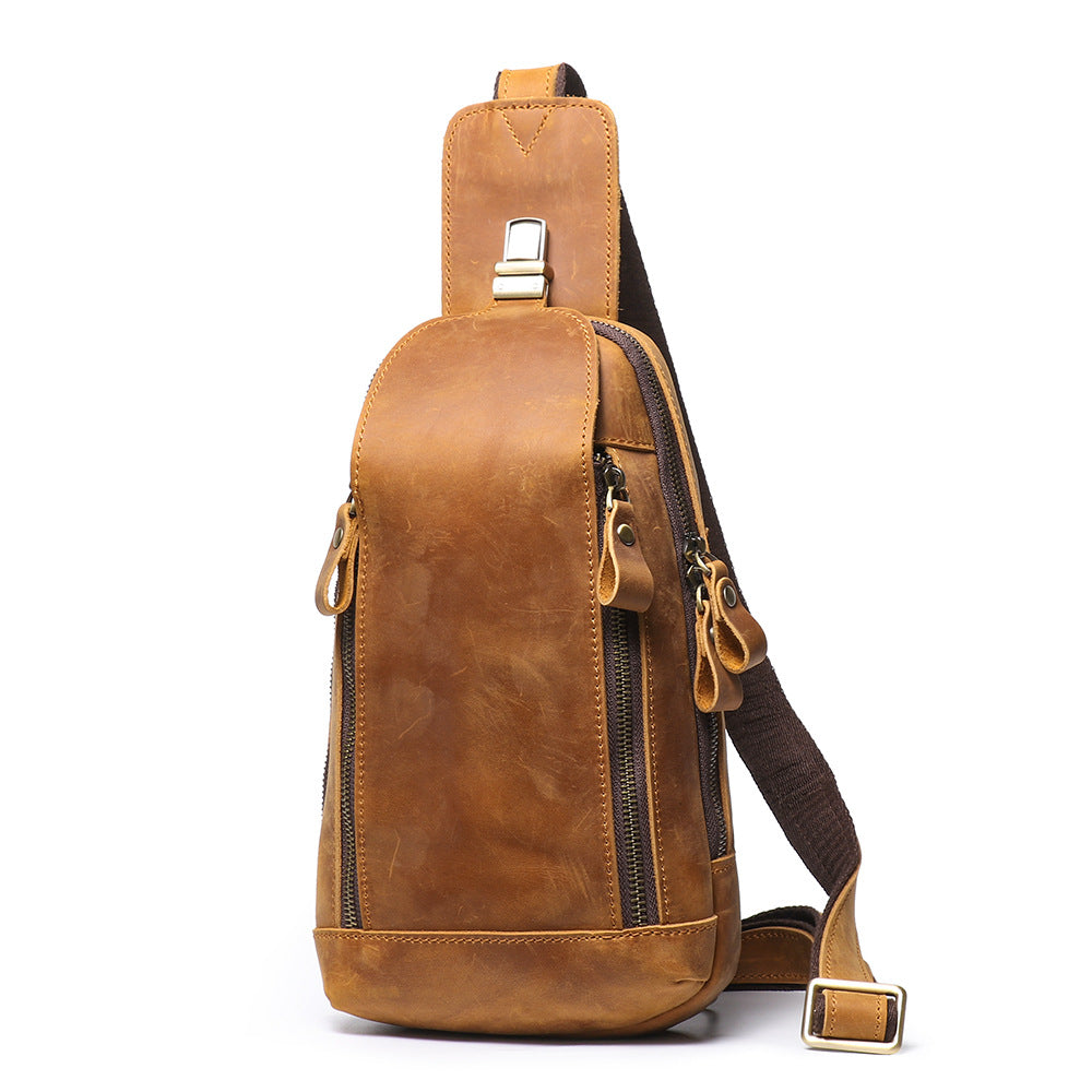 Brown leather sling bag on a white background