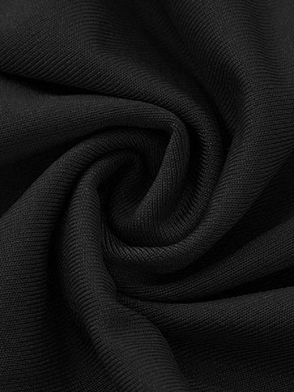 Close-up of black fabric with a textured pattern