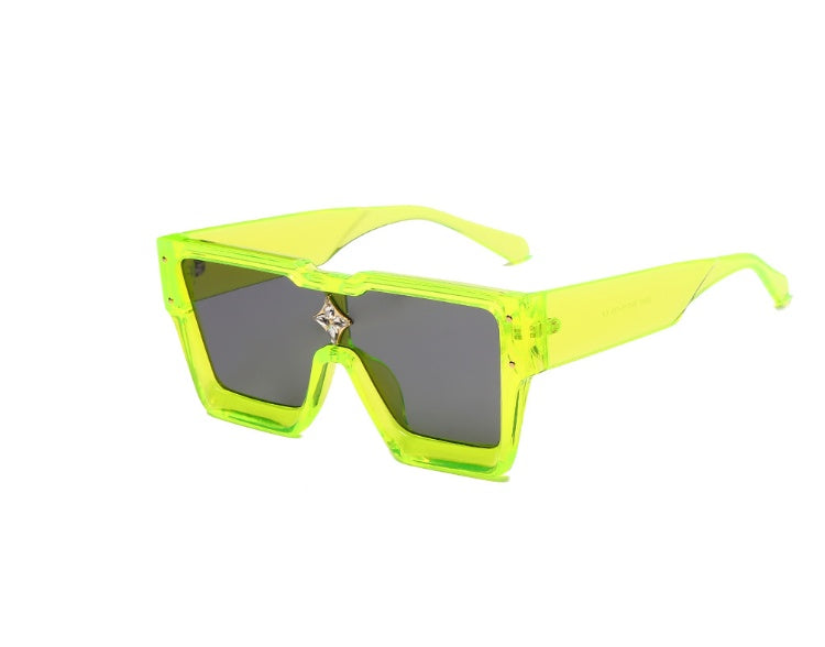 Neon green sunglasses with dark lenses on a white background