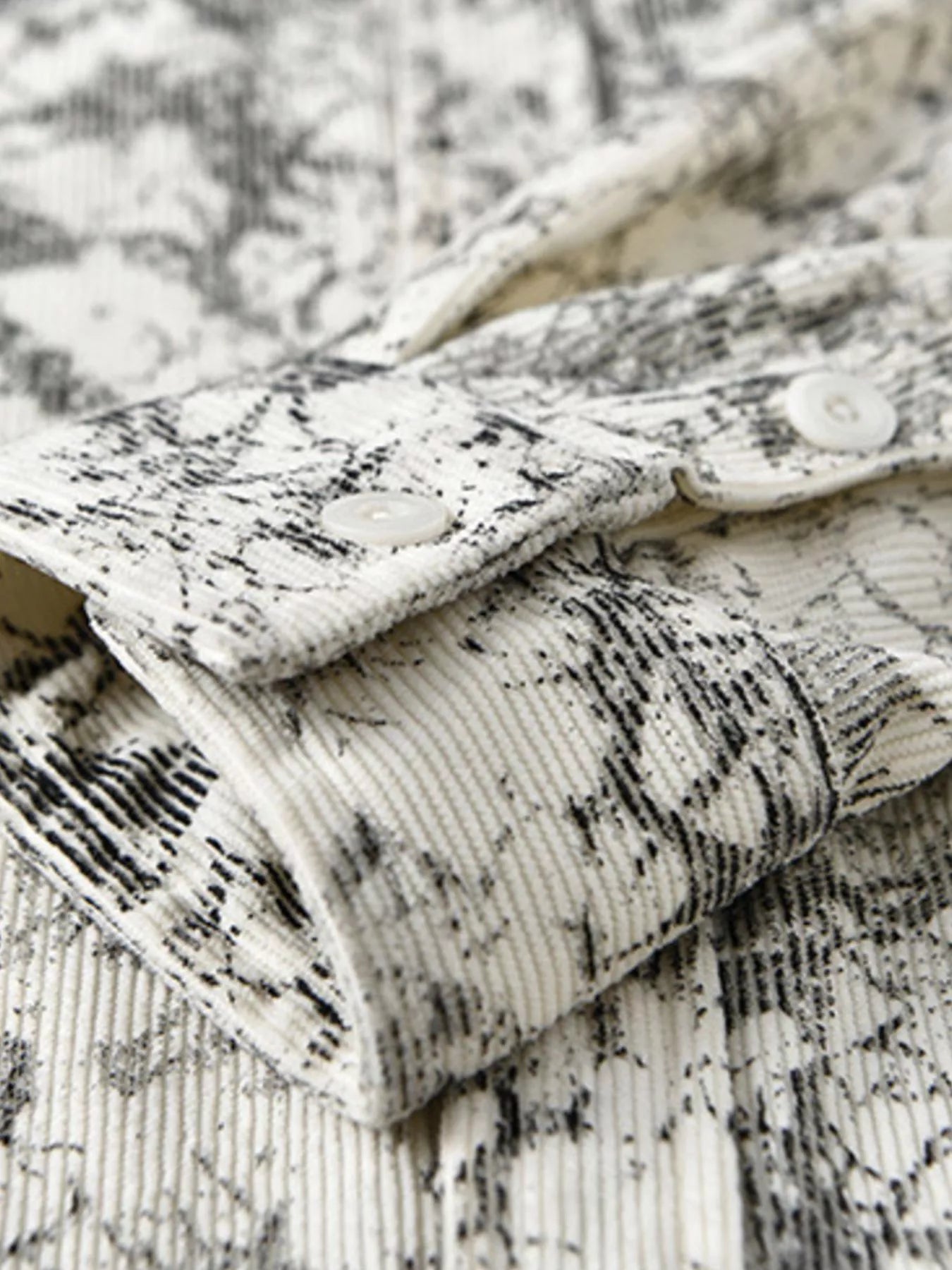 Close-up of a textured fabric with a patterned design.