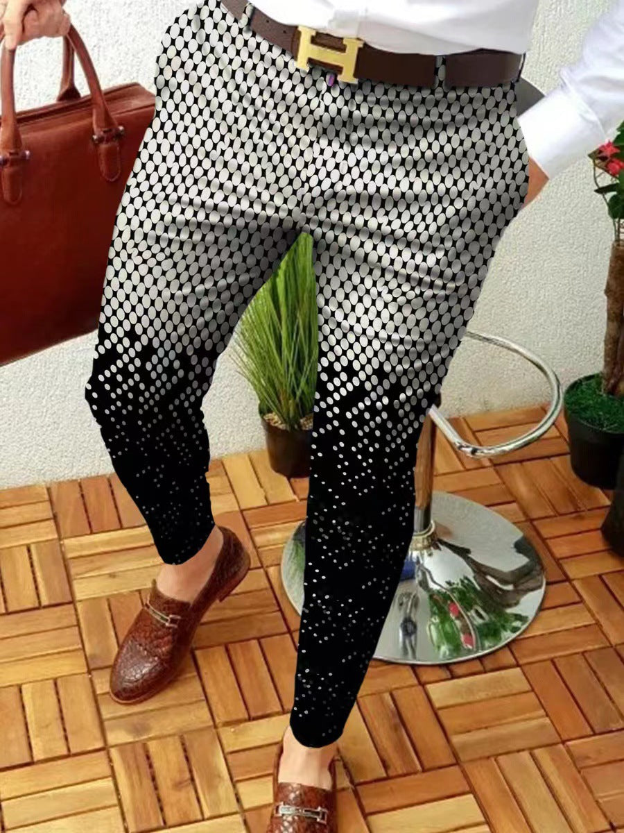 Person wearing black and white checkered pants with a brown belt, standing on a wooden floor.