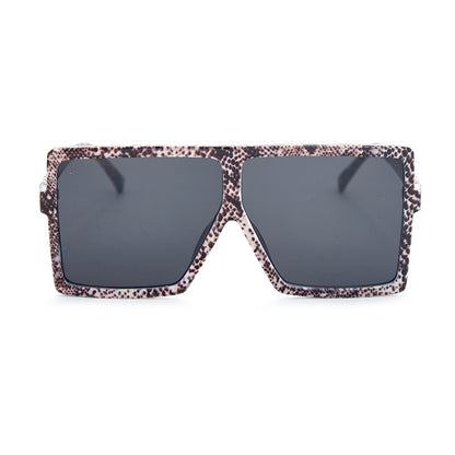 Sunglasses with a leopard print frame on a white background