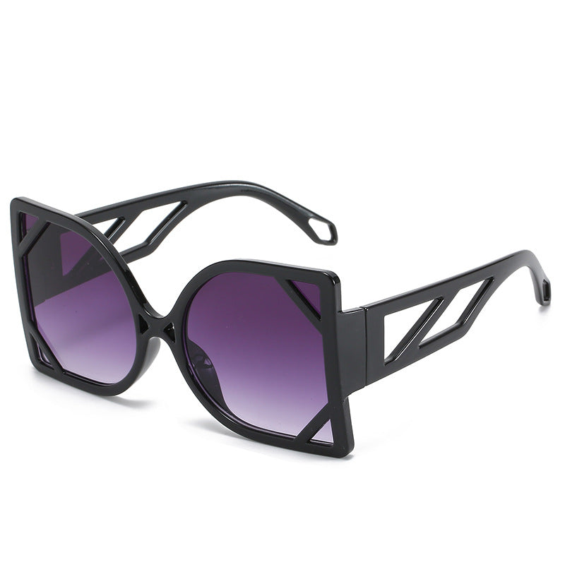 Black sunglasses with gradient purple lenses on a white background