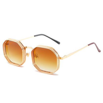 Gold-framed sunglasses with gradient lenses on a white background