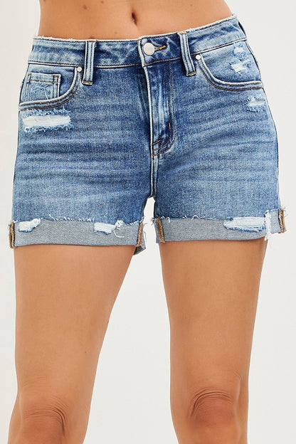 Blue denim shorts with distressed details on a white background