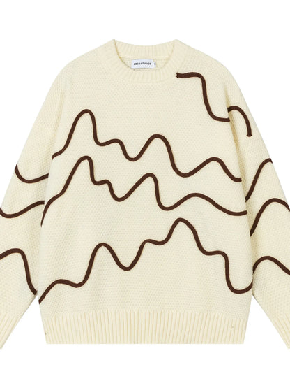 Cream-colored sweater with brown wavy lines on a white background
