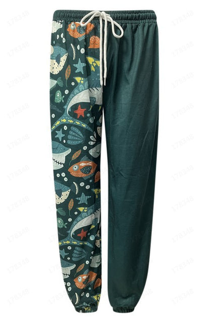 Dark green pants with colorful animal pattern on a white background
