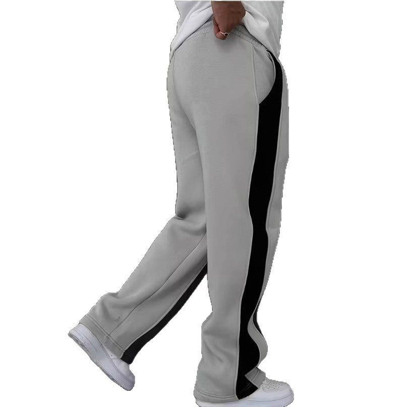 Gray sweatpants with black stripes on a white background