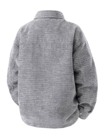 Gray textured shirt on a white background