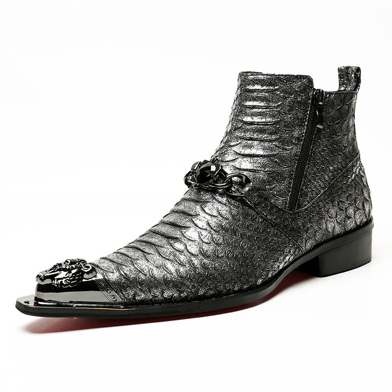 Silver metallic ankle boot with decorative elements on a white background