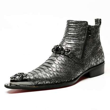 Silver metallic ankle boot with decorative elements on a white background