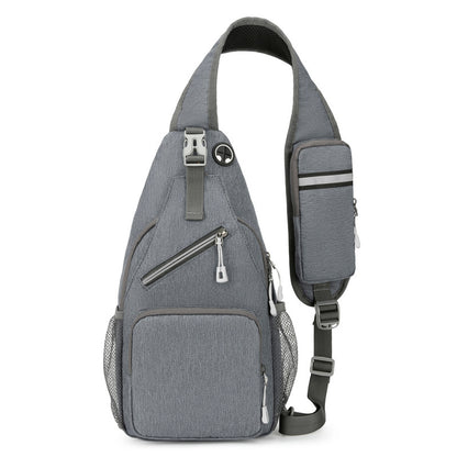 Gray sling bag with zippers on a white background