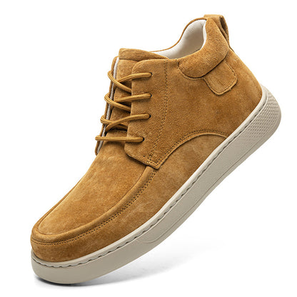 Tan suede shoe with white sole on a white background
