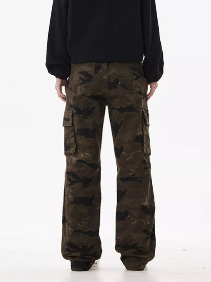 Person wearing camouflage cargo pants on a white background